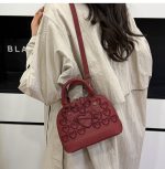 Women's bag with embroidered thread and shell design - Image 2