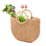 Half-round handbag made of woven grass with a beachy style - Image 2