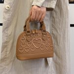 Women's bag with embroidered thread and shell design - Image 3