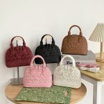 Women's bag with embroidered thread and shell design