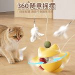 Cat figurine with feather and cat teasing stick - pet product