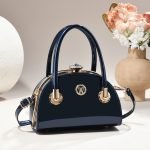 Clasp handbag with luxurious shiny material - Image 4